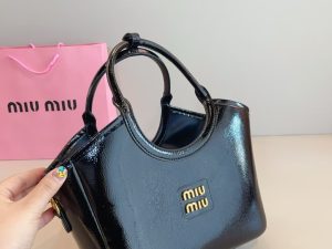 MIU MIU IVY Leather Tote Bag in black with iconic MIU MIU logo, luxury design.