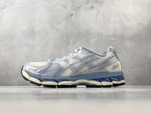 KITH x ASICS GEL-KAYANO 12.1 Loyalty Pack running shoes in Nebula Ice Blue Cream colorway — side view showing FluidRide midsole and GEL cushioning