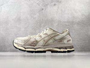 ASICS × KITH GEL-Kayano 12.1 Loyalty Pack running shoes in Beige Sand Cream colorway — side profile showing FluidRide midsole and GEL cushioning system