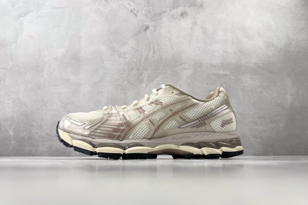 ASICS × KITH GEL-Kayano 12.1 Loyalty Pack running shoes in Beige Sand Cream colorway — side profile showing FluidRide midsole and GEL cushioning system