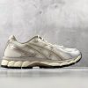 ASICS × KITH GEL-Kayano 12.1 medial side view showing GEL cushioning unit window and beige colorway upper construction