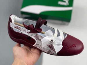Dark Crimson PUMA ballet sneakers with lace panels and satin bows