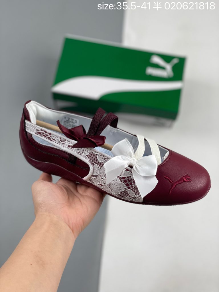 Dark Crimson PUMA ballet sneakers with lace panels and satin bows