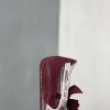 White floral lace and burgundy bow detail on PUMA ballet sneaker