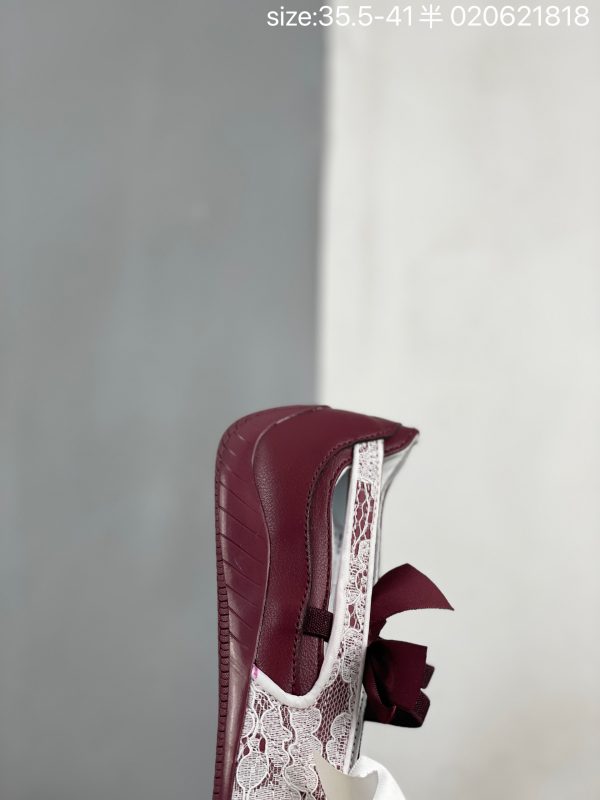 White floral lace and burgundy bow detail on PUMA ballet sneaker