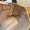 Interior of Louis Vuitton Neverfull MM tote with striped lining and zipped pocket