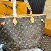 Back view of Louis Vuitton Neverfull MM tote with brown monogram pattern and natural-tone handles