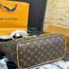 Bottom and side profile of Louis Vuitton Neverfull MM monogram tote showing structured trim